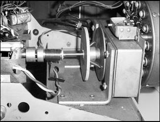 coupling between synchronous motor and tone generator drive shaft